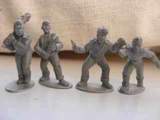 BG-AC5001 Atomic Cafe - 50&#39;s Gang (9) and Mutant. Pic of 4 figures one with bat, one with wrench, two with knives,  Unpainted 28mm metal  Sculpted by Paul Hicks